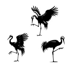 vector set of a crane bird standing on one foot. black silhouette of a heron isolated on white background.