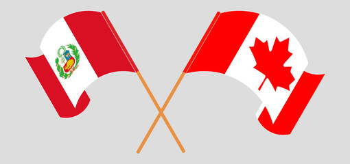 Crossed and waving flags of Peru and Canada