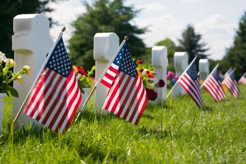 Tranquil cemetery landscape with white crosses, American flags, vibrant flowers, and clear sky.