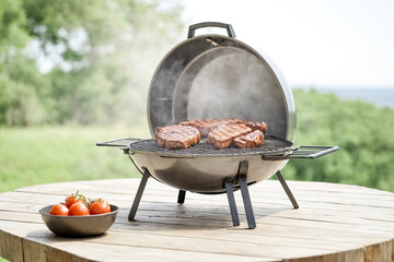 Steaks Grilling on a Charcoal Grill