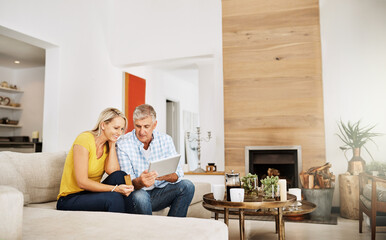 Couple, read and tablet on sofa for social media, news and online on couch in living room. Technology, internet and app on digital website in home, man and woman people in lounge with touchscreen