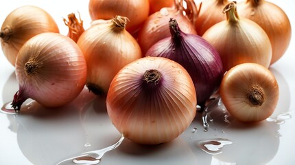 bunch of onion on plain white background with water splash