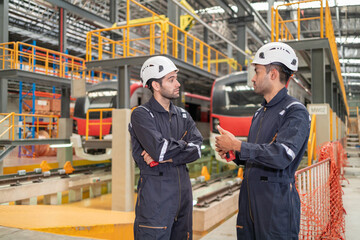 Train Engineers Discussing Maintenance in Depot