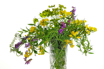 Bouquet of meadow flowers in a vase