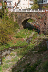 old bridge over the river in the village