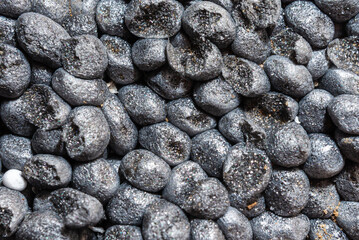 expanded polystyrene board eps with graphite macro shot, background.