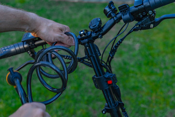 Anti-theft lock for a bicycle, audible alarm for an electric bicycle