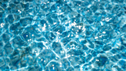Background of blue water in the pool.