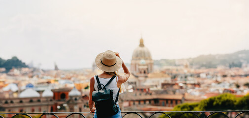 Young attractive smiling girl tourist exploring new city at summer © Vasily Makarov
