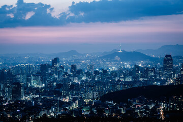 Seoul City skyline and skyscrapers View of Seoul at night in Gangnam District area There is Namsan Mountain in the background, South Korea.