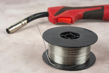 Spool of wire for semi-automatic welding machine MIG MAG