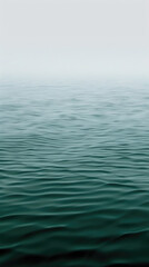 Obraz premium A large expanse of water with the sky in the background, creating a serene and expansive scene