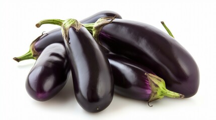 Bunch of fresh purple eggplants isolated on white background showcasing their vibrant color