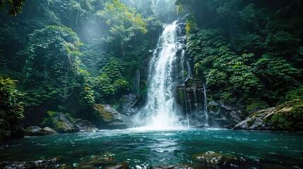 Crystal-clear waterfall in a tropical forest, symbolizing the beauty and importance of natural water sources
