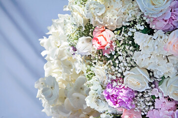 Beautiful floral arrangement with bunch of flowers for the wedding ceremony.