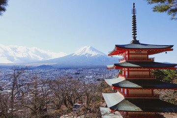 The iconic view of Mount Fuji with the red Chureito pagoda and Fujiyoshida city from Arakurayama...