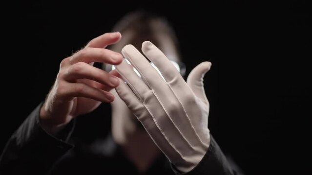 Anime villain with glowing eyeglasses remove white gloves removes restraint 4K