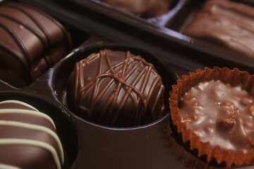 Closeup of chocolate candies in a box