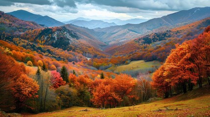 Scenic autumn landscape with pastel mountains and a valley filled with fall foliage.