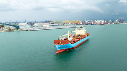 container ship sailing in sea, shipping business and industry service of cargo logistic import and export international freight transportation by container ship in open sea, aerial view