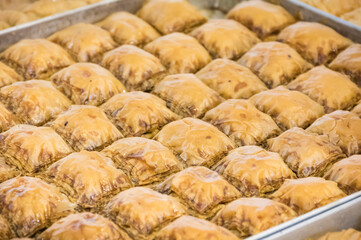 Turkisch baklava. Sweet pastry made of layers filo dough with pistachio, nuts and honey