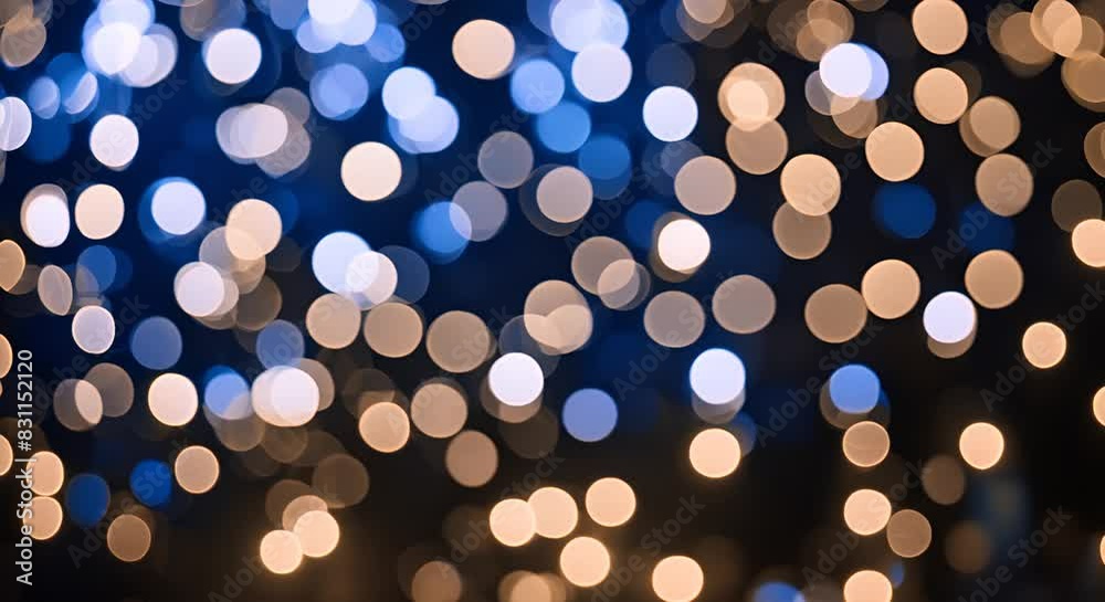 Poster defocused warm yellow bokeh lights against a dark background, creating a festive and cozy atmosphere