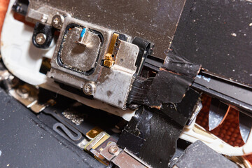 Broken smart phone closeup, macro shot.