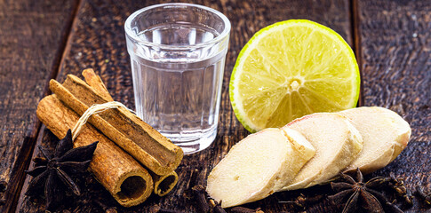 ingredients used to make winter drink, ginger, lemon, cloves, cinnamon sticks or anise. Ingredients...