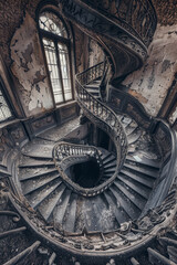 Obraz premium Dusty Spiral Staircase in Decaying Mansion - Liminal Image