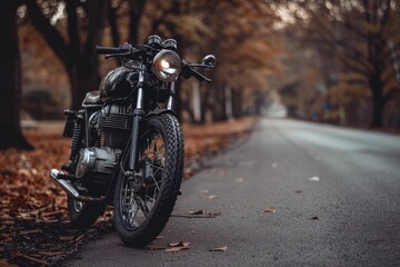 Motorcycle Roads. Vintage Black Motorcycle Parked on Roadside with Helmet and Handlebar