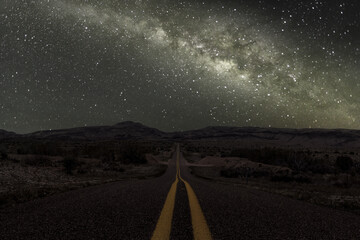 The milky way over  a backroad in Texas