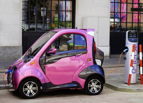 Kitty the compact electric quadricycle during a charging phase.Milan - Italy,28 May 2024