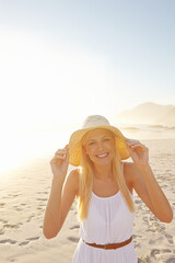 Portrait, beach and woman in nature with hat for summer vacation, holiday trip or tropical getaway. Travel, outdoor and female person with smile for happiness, weekend adventure or journey to Mexico