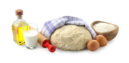 Raw dough and ingredients isolated on white
