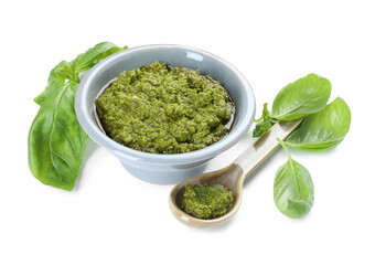 Fresh tasty pesto sauce and basil isolated on white