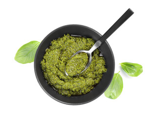Fresh tasty pesto sauce and basil isolated on white, top view
