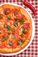Delicious pizza Diablo on table, top view