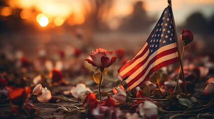 A dramatic image showing a US flag with flowers at sunset, symbolizing patriotism and tribute