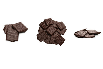 Dark chocolate candies isolated on white background.