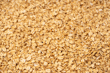 Oat-flakes as a background. Top view.