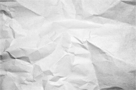 Halftone crumpled paper texture with a transparent background