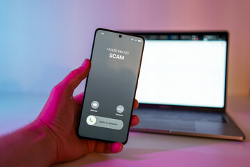 Scam call concept on mobile phone. Person get scam call alert. Phone call from unknown number late at night. Scam, fraud or phishing with smartphone concept. Prank caller, scammer or stranger