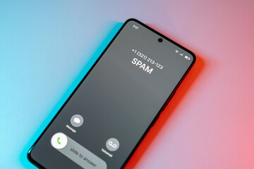 Fototapeta premium Spamer call on phone. Spam incoming call on cell phone. Spam and junk concept