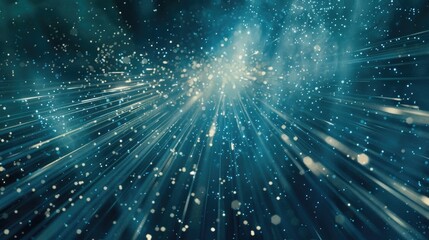 Fototapeta premium Enchanting loop of blue glitter particles drifting down softly in delicate light rays, creating a mesmerizing effect