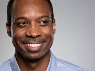 Obraz premium portrait of a black man, afro american guy smiling, beauty of happy man