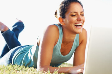 Laptop, smile and summer with woman on grass, outdoor in garden for browsing, research or social...