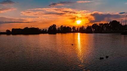 Sunset with reflections near Plattling, Isar, Bavaria, Germany