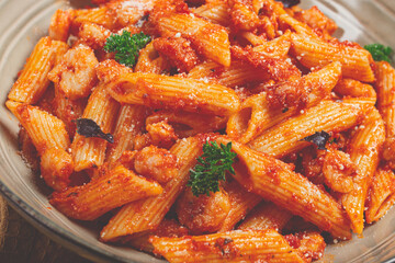 Penne pasta, with shrimp in tomato sauce, close-up, no people,