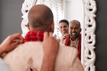 Smile, mirror and Indian man at traditional wedding, clothes and getting ready for celebration in...