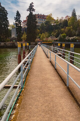 Beautiful spring view with reflections and a perspective view of a kay at Mainau island, Lake Bodensee, Baden-W&uuml;rttemberg, Germany